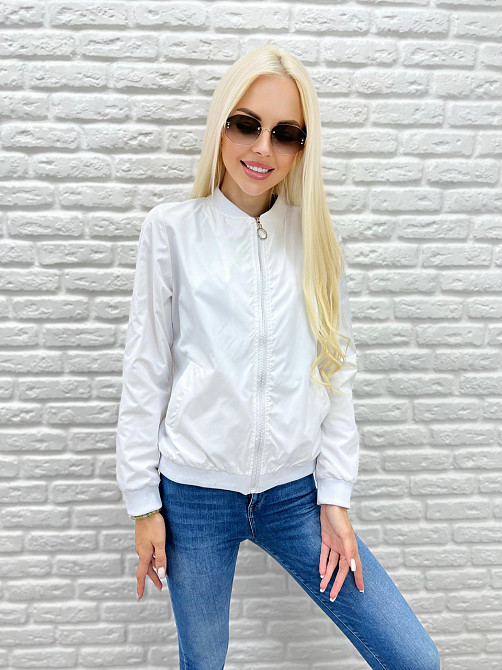 Жіноча вітровка з щільної плащівки "Leland" оптом | Розпродаж моделі Білий, 42-44 Київ - фото 3