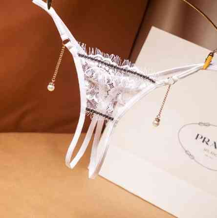 Еротичні стрінги з розрізом білі - розмір універсальний, резинка до 84см Київ