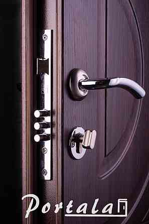 Двери уличные, серия Элегант, модель Рассвет, гнутый профиль, 2 контура уплотнения, 2 замка Киев