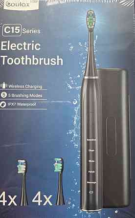 Електрична зубна щітка Coulax C15. Київ