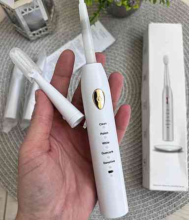 Электрическая зубная щетка. Киев