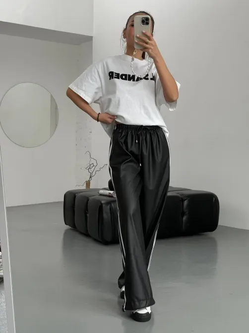 Жіночі теплі шкіряні штани з лампасами на флісі знизу з затяжками Харків - фото 3