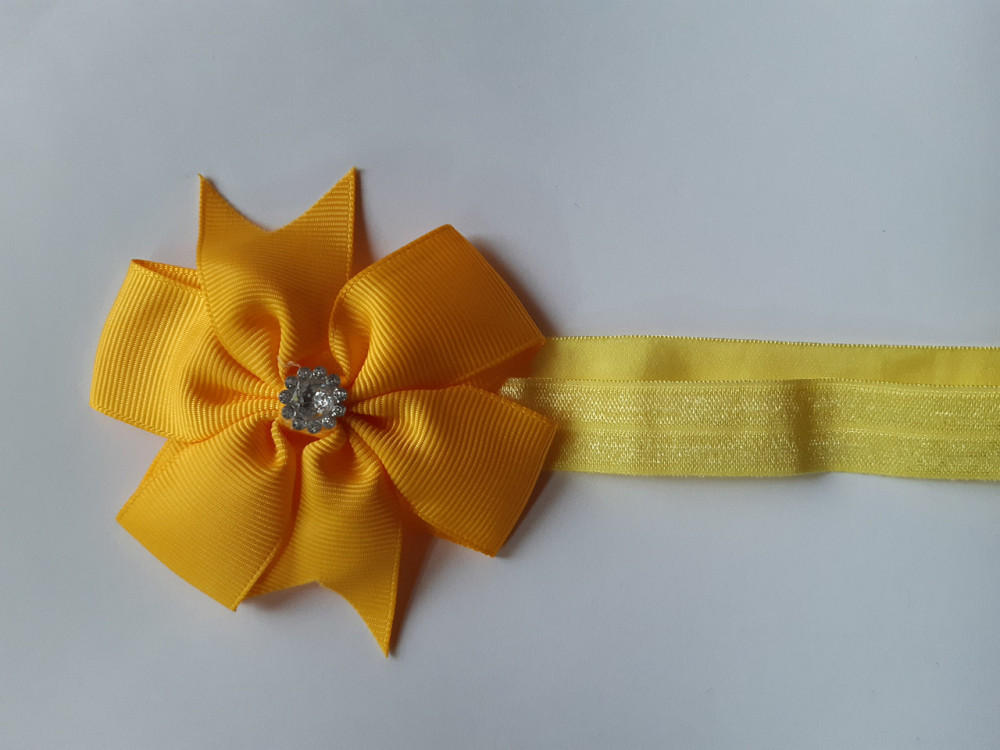 Дитяча пов'язка жовтого кольору - окружність 36-58см, бант 8см Київ - фото 1