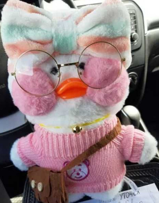 Жовта качка Лалафанфан-коченя в окулярах гойдалка Київ - фото 5