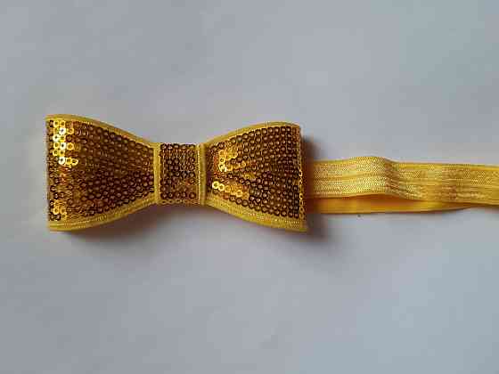 Пов'язка дитяча жовта з паєтками - бант близько 10см, окружність 36-48см Київ