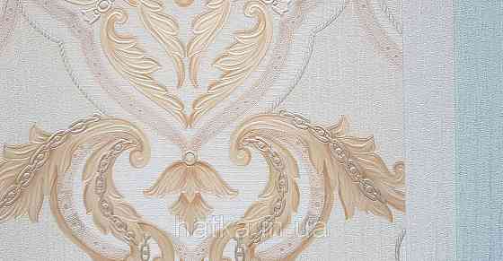 Шпалери вінілові на флізеліні AdaWall Seyyah 1.06х10 вензелю завитки великі структурні золотом на бежевому Київ