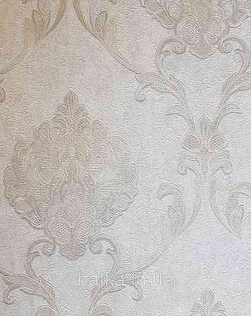 Шпалери вінілові на флізеліні Grandeco Anastasia метрові вензелю завитки структурні сріблясті на білому Київ
