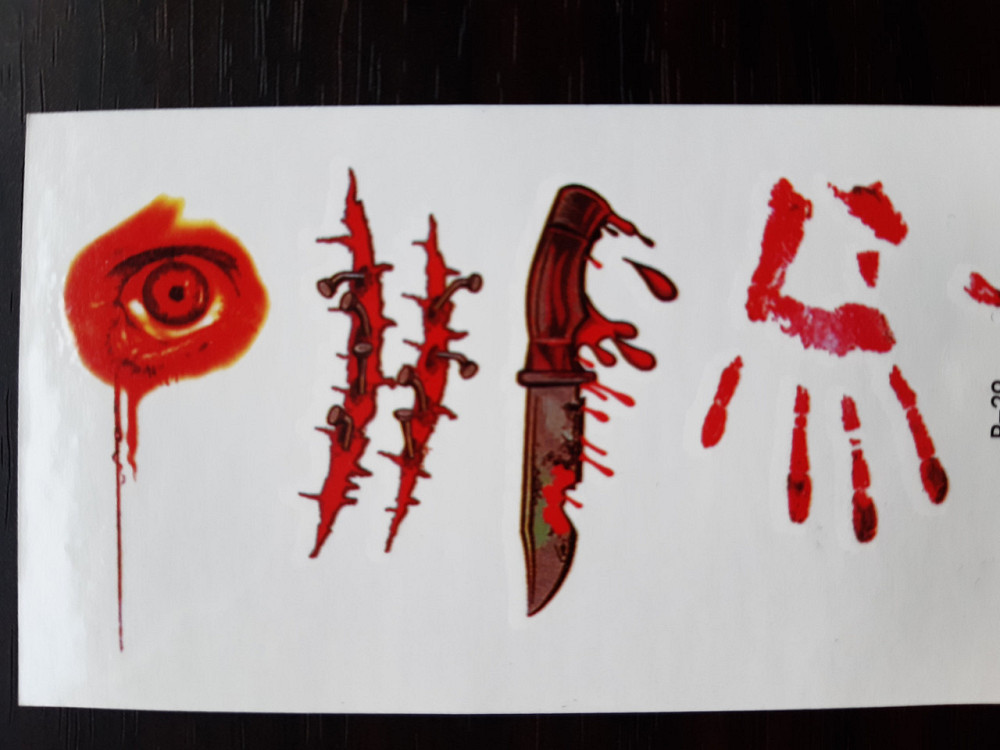 Тимчасове татуювання Криваві ножа 10 на 6 см червоний Київ - фото 1