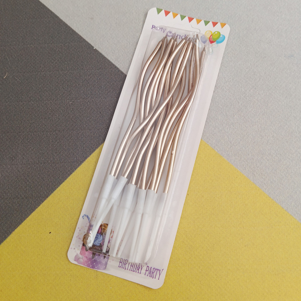 Свічки для торта "хвилясті" 12 шт. рожеве золоті Київ - фото 1