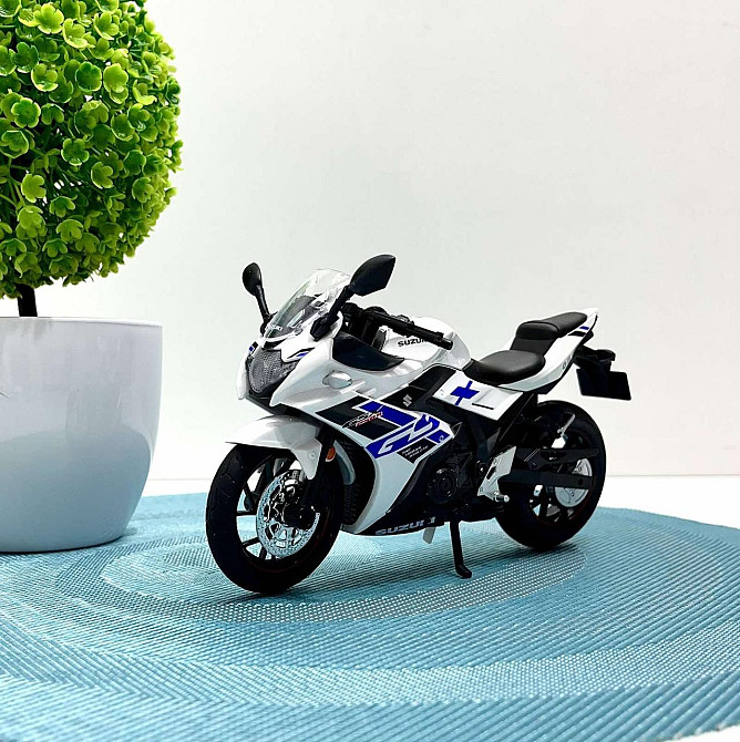 Мотоцикл металопластиковий звуки підсвічування гумові шини рухомі елементи 1:12 Білий (BG 69-325) Чернігів - фото 7