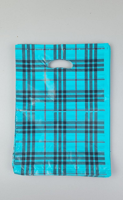 Пакети з вирубаною ручкою (25*35) "Карта" Комсерв (100 шт.) Харків - фото 1