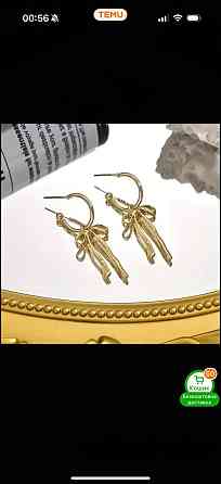 Сережки з бантиком золотого кольору – витончені підвісні Київ