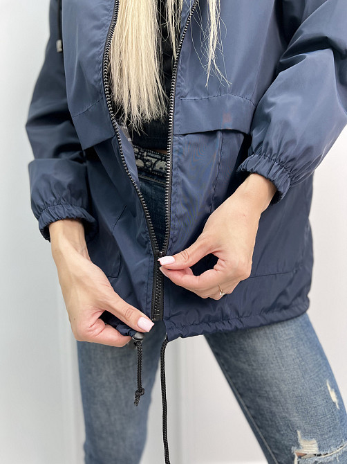 Жіноча вітровка на підкладці з капюшоном "Tysson" оптом | Норма і батал | Розпродаж моделі Київ - фото 6
