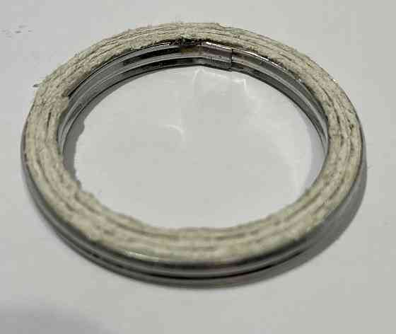 Прокладка коліна глушника МІНСЬК (метало-азбестова) VDK Киев