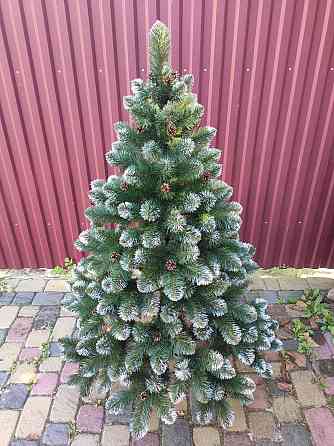 Штучна ялинка з інеєм та шишками ПВХ плівка Одеса