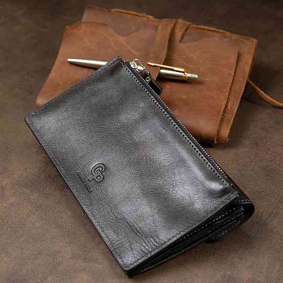 Практичное стильное портмоне унисекс GRANDE PELLE 11558 Черный Киев