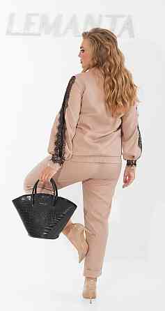 Гарний брючний костюм із мереживом великого розміру Київ