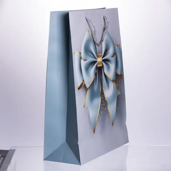 Подарункові пакети з паперу 12 шт з бантом 30×12×42 см Київ - фото 2