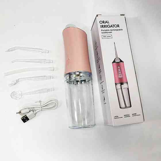 Іригатор для чищення зубів та порожнини рота Oral Irrigator з акумулятором та змінними насадками. VC-562 Колір: рожевий Київ