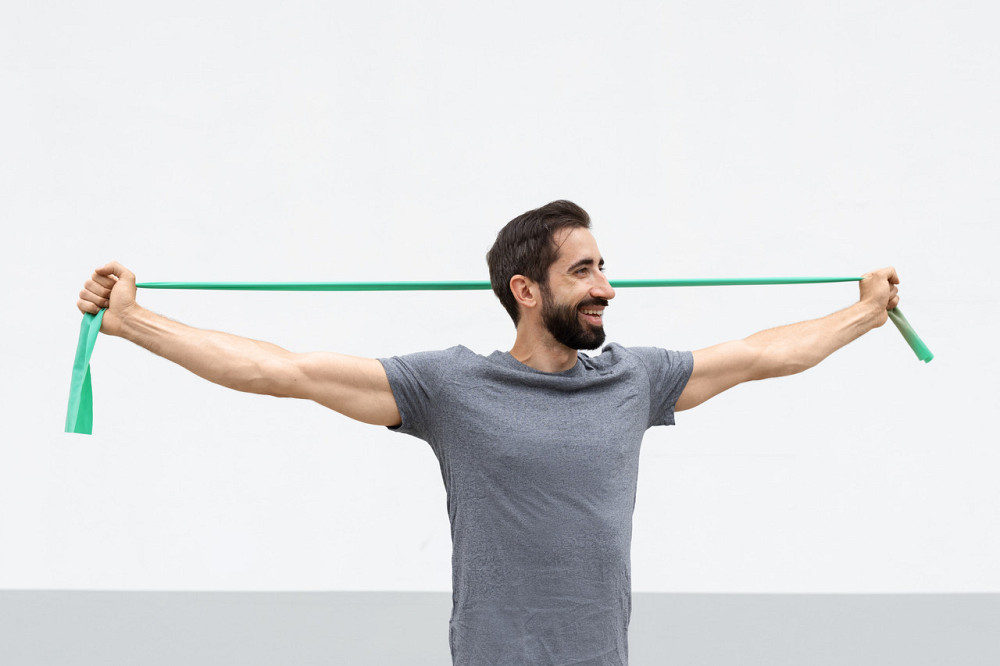 Стрічка-еспандер для фітнесу та реабілітації U-POWEX Fitness band 0.5мм. (9.1 кг) Green Каменское - изображение 9