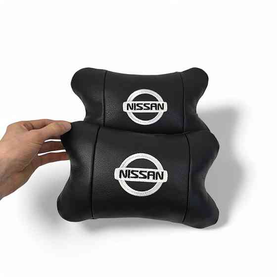 Подушки в авто 2 шт Nissan, натуральна шкіра, з логотипом Ніссан, на підголівник для CN-397 вашої машини Київ