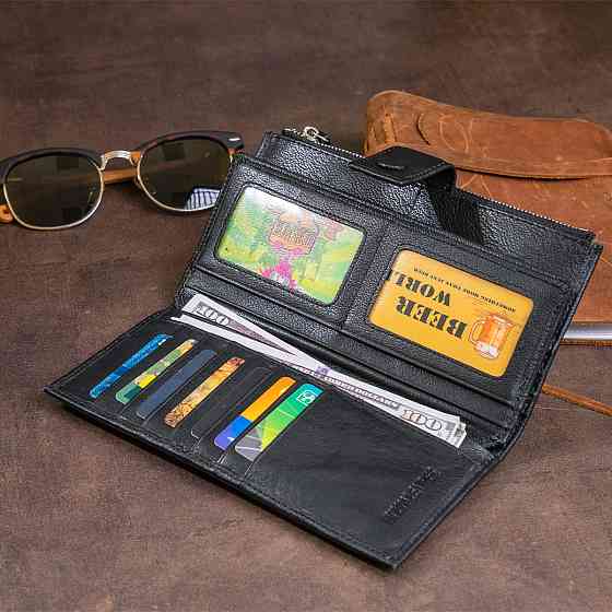 Оригінальний гаманець шкіряний жіночий на хлястику з кнопкою ST Leather 19280 Чорний Київ