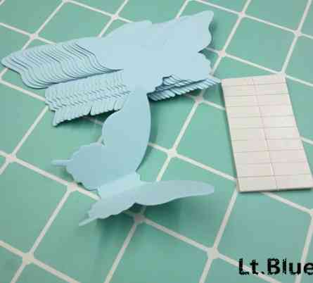 Декор стін метелики світло-блакитні - у наборі 20 штук розміром 8*5см, картон, є 2-х сторонній скотч Київ