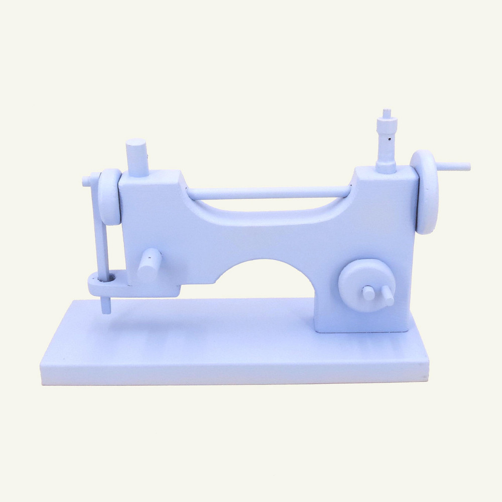 Игрушечная швейная машинка 