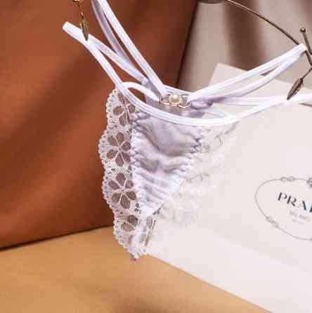 Еротичні стрінги білі - розмір універсальний, резинка до 90см Київ