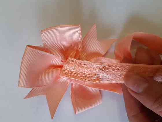 Дитяча персикова пов'язка З дефектом - на резинці, окружність від 30см до 48см, бант 9см Київ