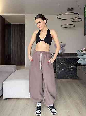 Женские теплые объемные брюки 