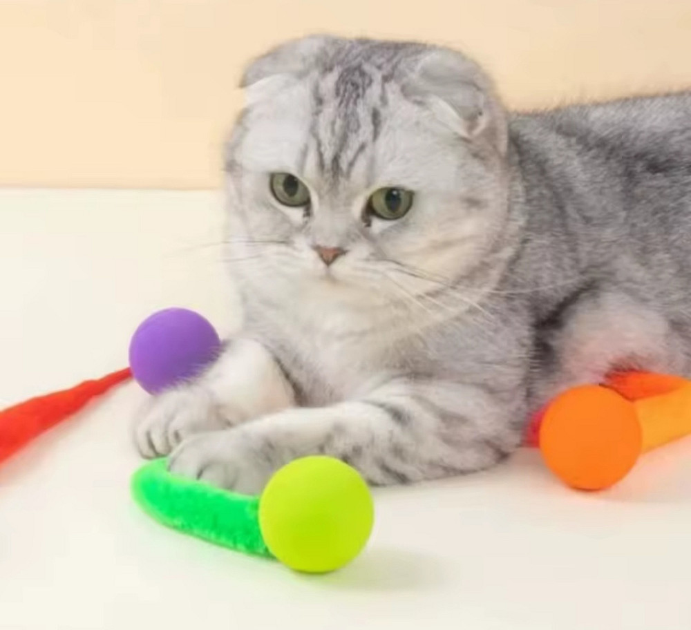 Игрушка для котов мячик попрыгунчик з хвостиком из искусственного меха 25 мм на 230 мм разноцветный Киев - изображение 1