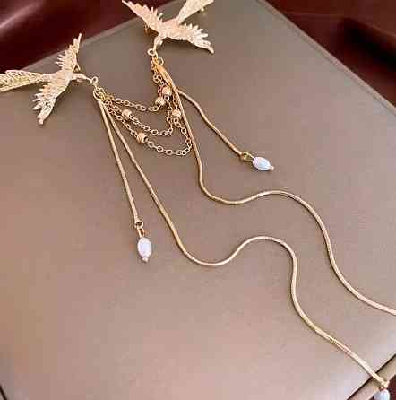 Брошь с птицами и цепочками – стильное золотистое украшение Киев