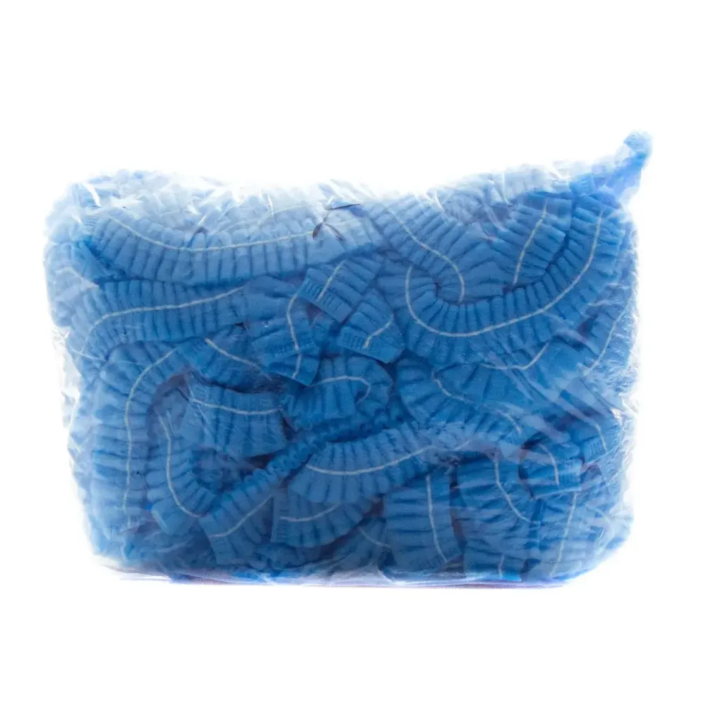 Шапочки медичні одноразові зі спанбонду блакитні 100 шт/уп Київ - фото 1