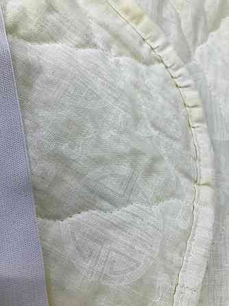 Novita Наматрацник Novita 200х220 см захисний антиалергенний з резинкою по кутах бежевий (40-00 Киев